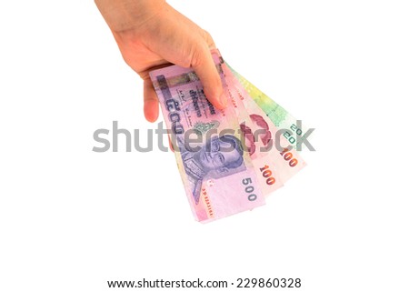  hand holding thailand paper currency from the top isolated on white