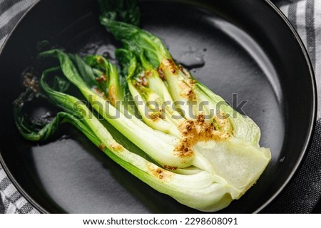 Bok choy or pak choy, Chinese stalked cabbage vegetable dish healthy meal food snack on the table copy space food background rustic top view keto or paleo diet veggie vegan or vegetarian food Royalty-Free Stock Photo #2298608091