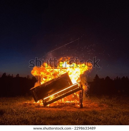 Piano burning in a field in Northern California Royalty-Free Stock Photo #2298633489