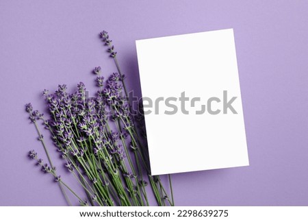 Blank elegant wedding invitation card mockup with copy space and lavender flowers decor