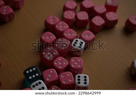Pink, white and blue dice