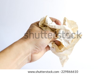 Crumpled paper on hand ,Hand and crumpled paper, isolated on white background