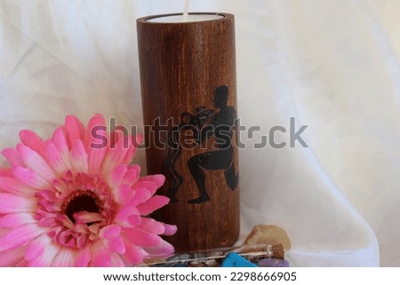 Beautiful and magical wooden candle holder with astrological Aquarius zodiac sign Royalty-Free Stock Photo #2298666905