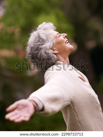 Happiness, senior woman with open arms enjoying life outdoors or success, happy and retired lady celebration of financial freedom. Healthy, smiling pensioner stretching with joy in retirement Royalty-Free Stock Photo #2298733713