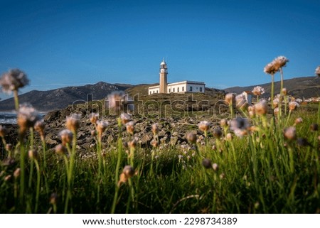 Lariño lighthouse during spring. Galicia, Spain Royalty-Free Stock Photo #2298734389