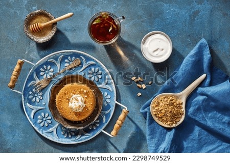 Middle Eastern or Arabic cuisine with a variety of mezze on a rustic concrete backdrop Food that is Halal. Cuisine from Lebanon, Turkey, and Egypt, with mixed veggies and a gorgeous table top view Royalty-Free Stock Photo #2298749529