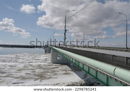 bridge over the river during ice drift