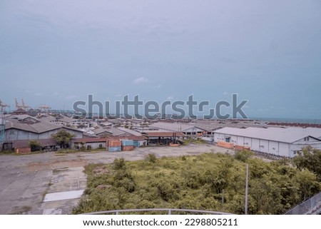 Arial view of power plant project with blue sky and cloudy vibes. The photo is suitable to use for industry background photography, power plant poster and electricity content media.