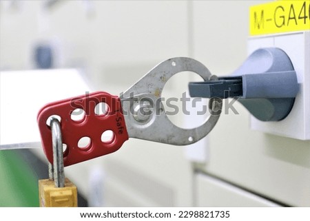 Lockout Tagout , Electrical safety system.Key lock switch or circuit breaker for safety protect.in electric room Royalty-Free Stock Photo #2298821735