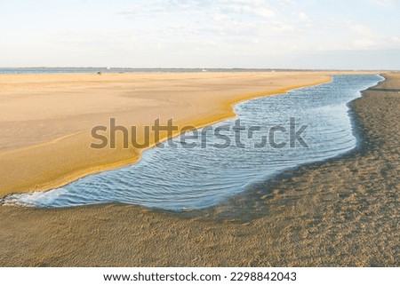 a long and narrow natural finger lake formed on a sandy hook and sandbar along a coastal barrier islands south eastern beach Royalty-Free Stock Photo #2298842043