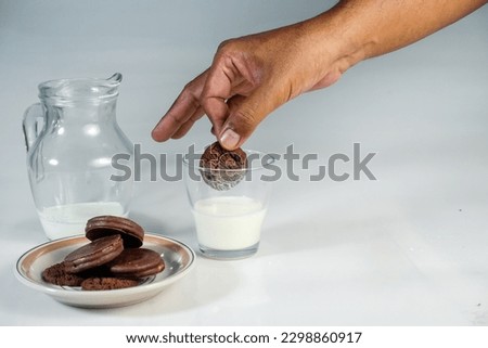 Background concept for world milk day,  picture a jug of milk and glass on the table,  isolated in white background, copy space.