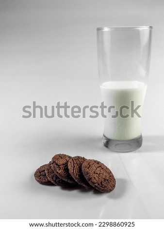 Background concept for world milk day,  picture a jug of milk and glass on the table,  isolated in white background, copy space.