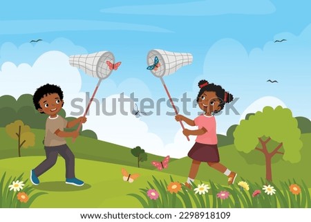 Cute little African kids catching butterflies with net at the garden in the spring season