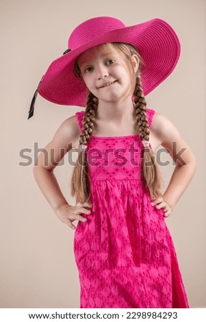 Kid Little Girl With Pink Dress and Hat