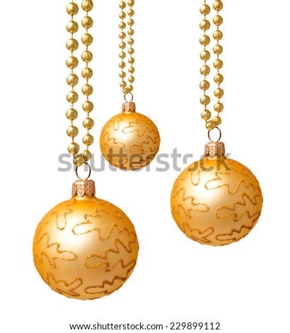 Hanging golden christmas balls isolated on a white background 