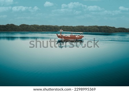 dhow boat at corniche al qasimi ras al khaimah Royalty-Free Stock Photo #2298995369