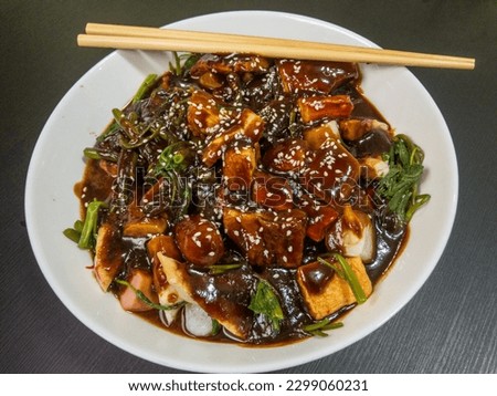 Yong Tau Foo with sweet sauce (street food) Royalty-Free Stock Photo #2299060231