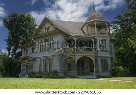 Historic Victorian Mansion Located in Rural East Texas Royalty-Free Stock Photo #2299061055