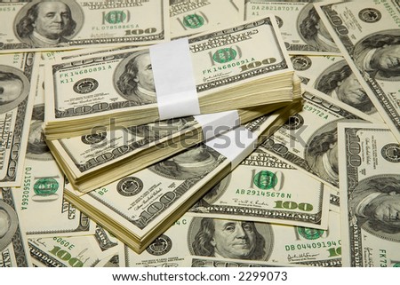 the thousands US dollars heap on dollars background