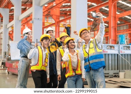 Project manager and engineer Groups diversity factory workers standing and take a selfie happy and cheerful at industrial manufacturing factory.