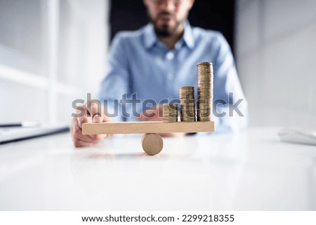 Financial Leverage Balance And Inflation Insurance Concept Royalty-Free Stock Photo #2299218355