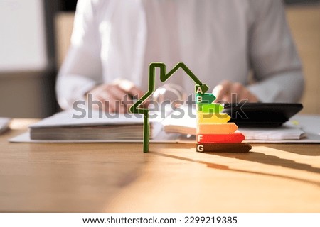 Energy Efficient House Building Audit And Insulation Royalty-Free Stock Photo #2299219385