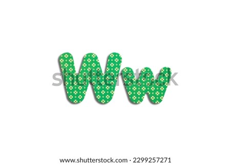 Alphabet letter W on a white isolated background. Top view, flat lay.
