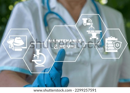 Doctor or nurse using virtual touch screen presses inscription: MAINTENANCE AND REPAIR. Maintenance and repair in healthacre concept with icons about assistance and servicing of equipments.