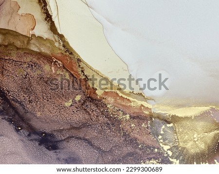Abstract purple art with beige and gold — violet background with brown, beautiful smudges and stains made with alcohol ink and golden pigment. Pink fluid art texture resembles watercolor or aquarelle.