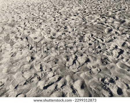 The traces of waves made in the sand on the coast.