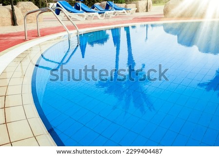 beautiful pool with steps near the sea on nature background