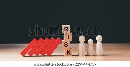 Financial Crisis, Economic, Business risk management concept. Risk word on wooden block, domino crisis effect. Concept Risk, Crisis, Management, Assessment, Insurance, Security, Financial, Economic Royalty-Free Stock Photo #2299444757