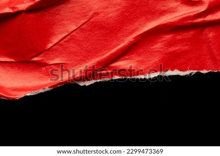 Red ripped paper torn edges strips isolated on black background Royalty-Free Stock Photo #2299473369