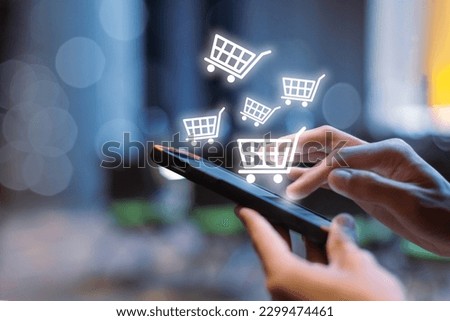 woman using smartphone shopping online, shopping cart icon on screen mobile phone. purchase payment on internet. online supermarket gadget. Royalty-Free Stock Photo #2299474461