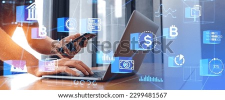 Man typing in computer with smartphone in hand. Decentralized finance hologram, internet banking and blockchain. Concept of technology, cryptocurrency and big business data research