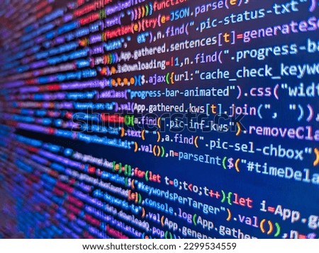 Lines of Html code visible. Programming code abstract screen. Software source code software background. Code on dark background. Technology background. IT business company