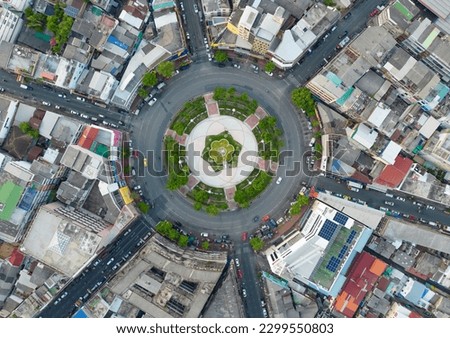 Wongwian Yai roundabout. Aerial view of highway junctions. Roads shape circle in structure of architecture and technology transportation concept. Top view. Urban city, Bangkok, Thailand.
