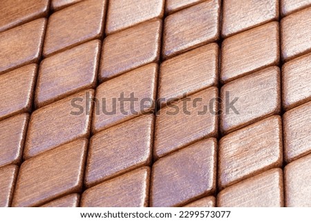 Abstract pattern of rhombus brown bamboo wood pieces
