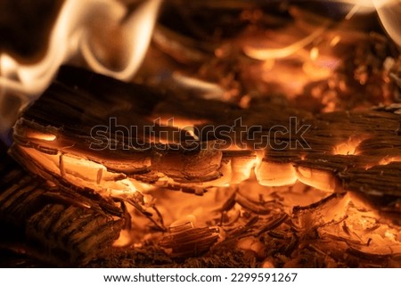 Close Up of Embers in a Fire Place Royalty-Free Stock Photo #2299591267