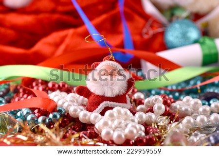 Santa Claus with gifts, pearls and diamonds
