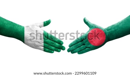 Handshake between Bangladesh and Nigeria flags painted on hands, isolated transparent image.