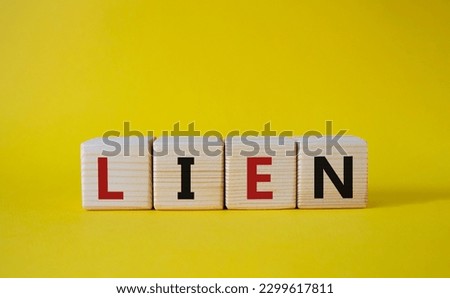 Hype symbol. Concept word Hype on wooden cubes. Beautiful yellow background. Business and Hype concept. Copy space.