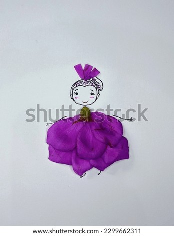 little fairy character with her purple petals dress which is so beautiful