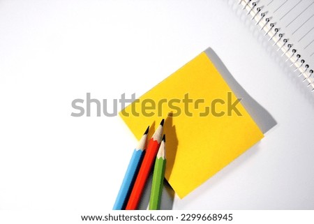 Pencil and notebook close-up stationery concept