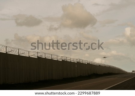 Background of prison warfare, barbed wire fence in Phuket Thailand