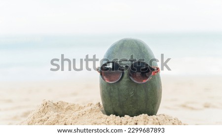Fruit man made from watermelon on the beach fruit tourism for health Funny and cute sunbathing fruits. Festive food. Summer travel concept. white background design invitation to visit copy space