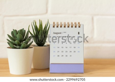 Desktop calendar for August 2023. Calendar for planning and managing each date Royalty-Free Stock Photo #2299692705