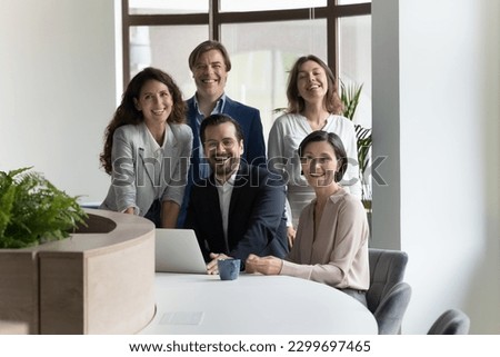 Professional staff portrait, business success and career. Five diverse businesspeople, office employee, teammates smile posing for camera, photo shooting in workplace during break for corporate album