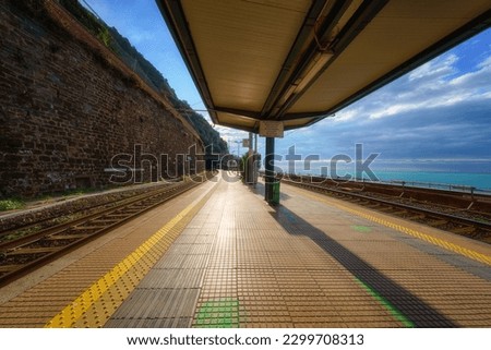 Train station platform in Manarola village on a sunny day, Cinque Terre National Park, Liguria, Italy. Transportation and travel background
