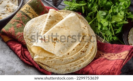 Crispy Corn Delight: Top-View Close-up of Baked White Corn Tortilla, Perfectly Golden Royalty-Free Stock Photo #2299753639
